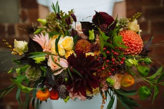 Image 0 of the wedding flowers for Georgina & David's wedding at All Saints, Siddington & Sandhole Oak Barn